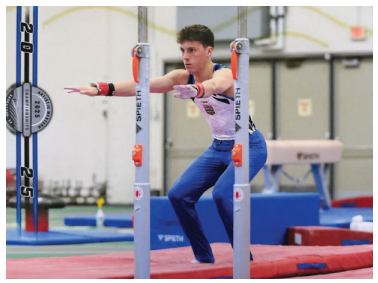 Bellerose Student Xavier Lefebvre competing in parallel bars at Western Canadian Championships where he placed first.